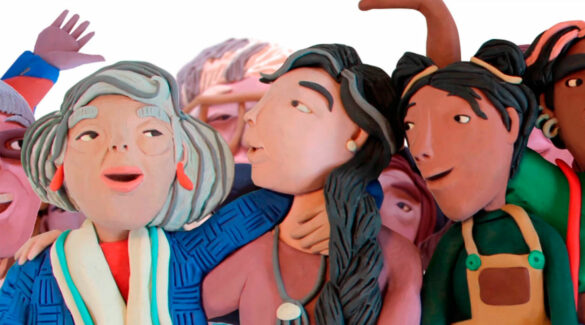 Imagen de portada del libro "Nosotras en Libertad", muestra un grupo de mujeres de diversas edades moldeadas en plastilina.